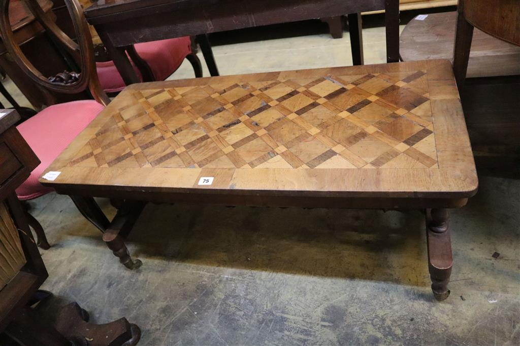 A Victorian walnut parquetry topped occasional table, width 50cm, depth 102cm, height 47cm